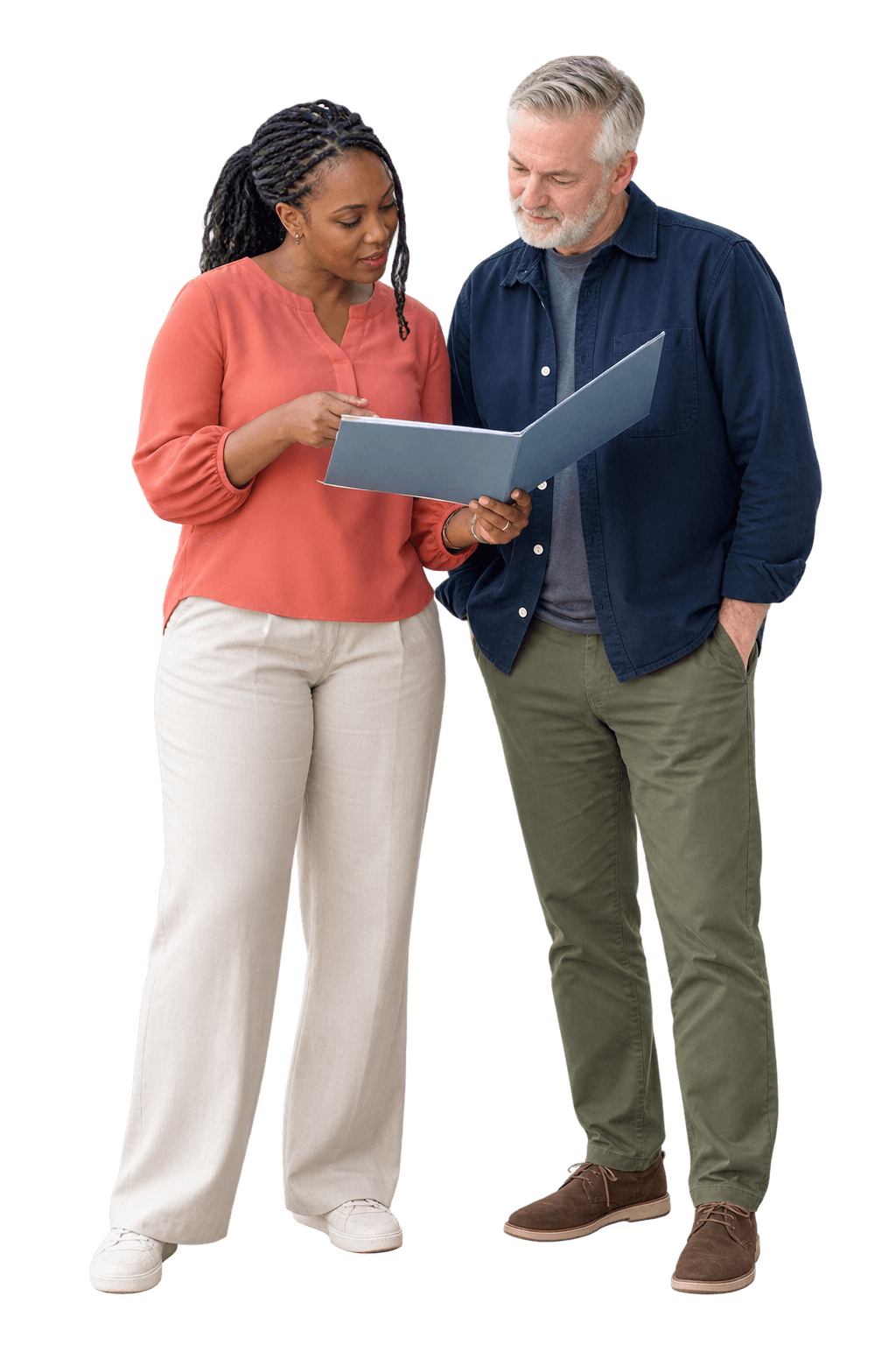 Two mission-driven organisation colleagues reviewing a programme folder